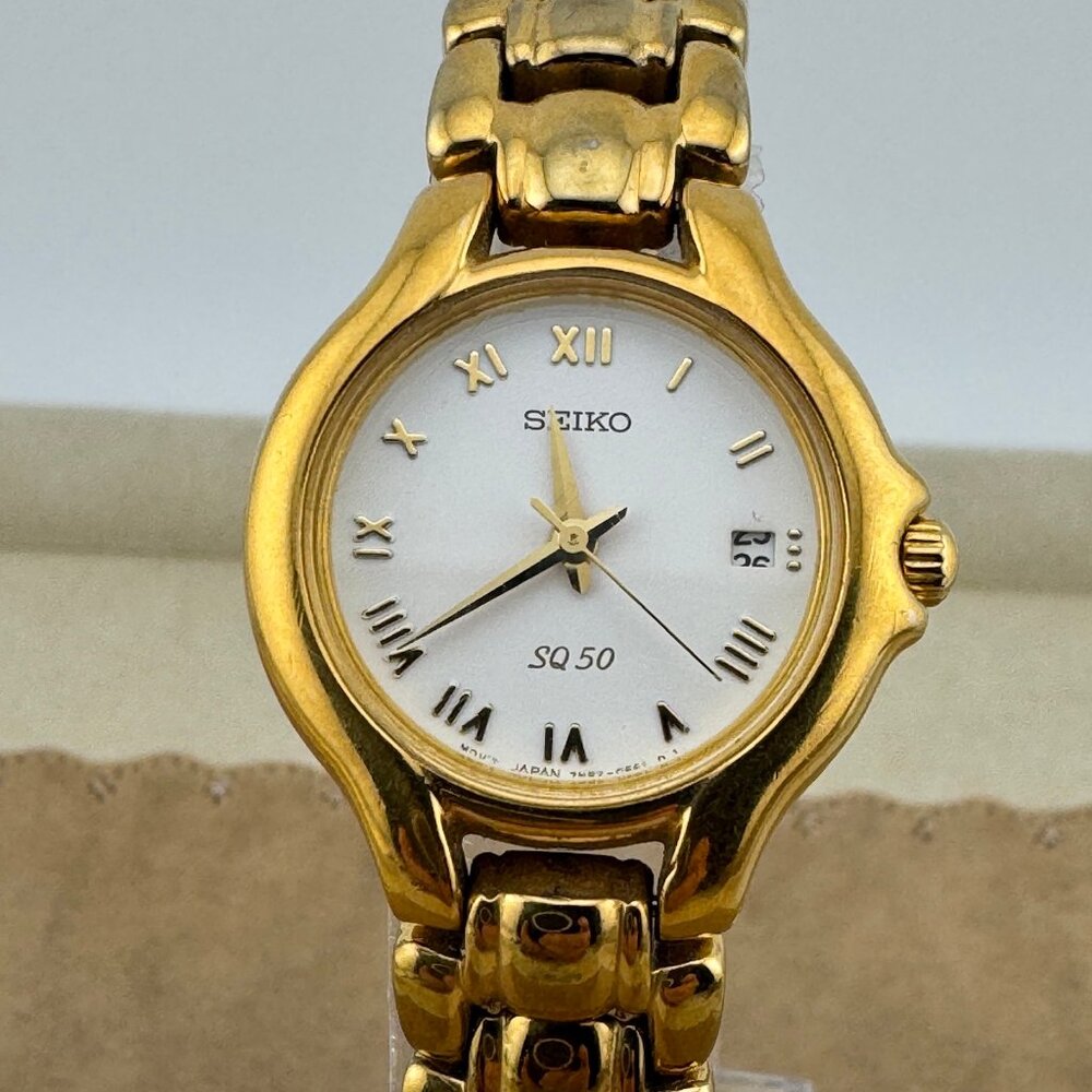 Vintage Ladies Seiko SQ50 Gold Tone Roman Numeral Watch